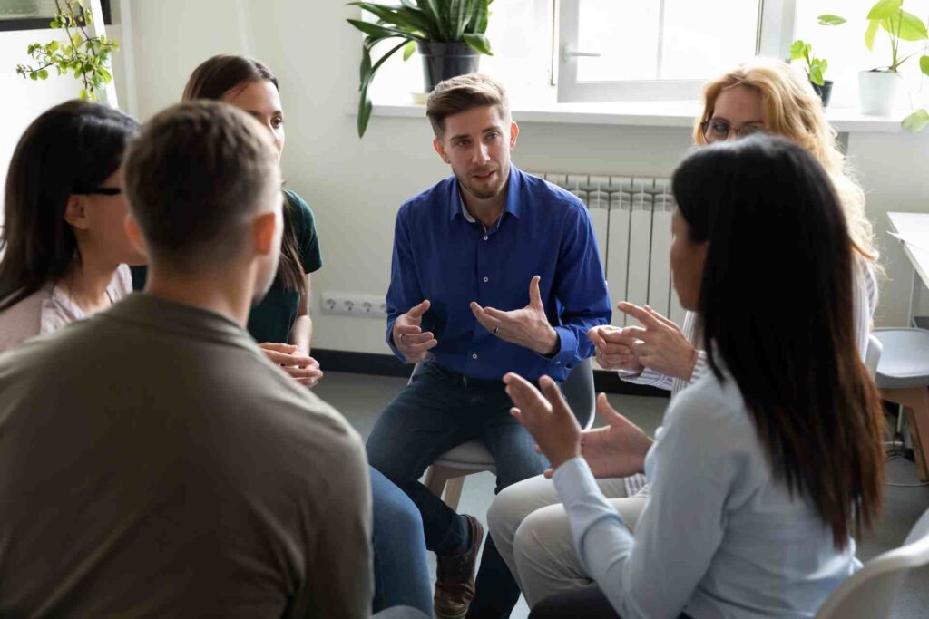 Group therapy session for co-occurring disorders treatment and mental health recovery